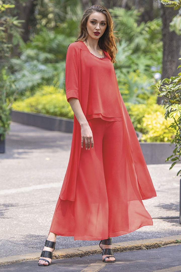 Conjunto De Pantalon Amplio Con Blusa Y Pedreria En Cuello Y Ensamble Largo