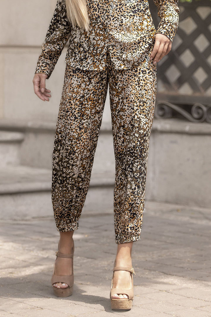 Pantalón Amplio Con Bolsas Y Resorte En Tobillos Estampado De Animal Print