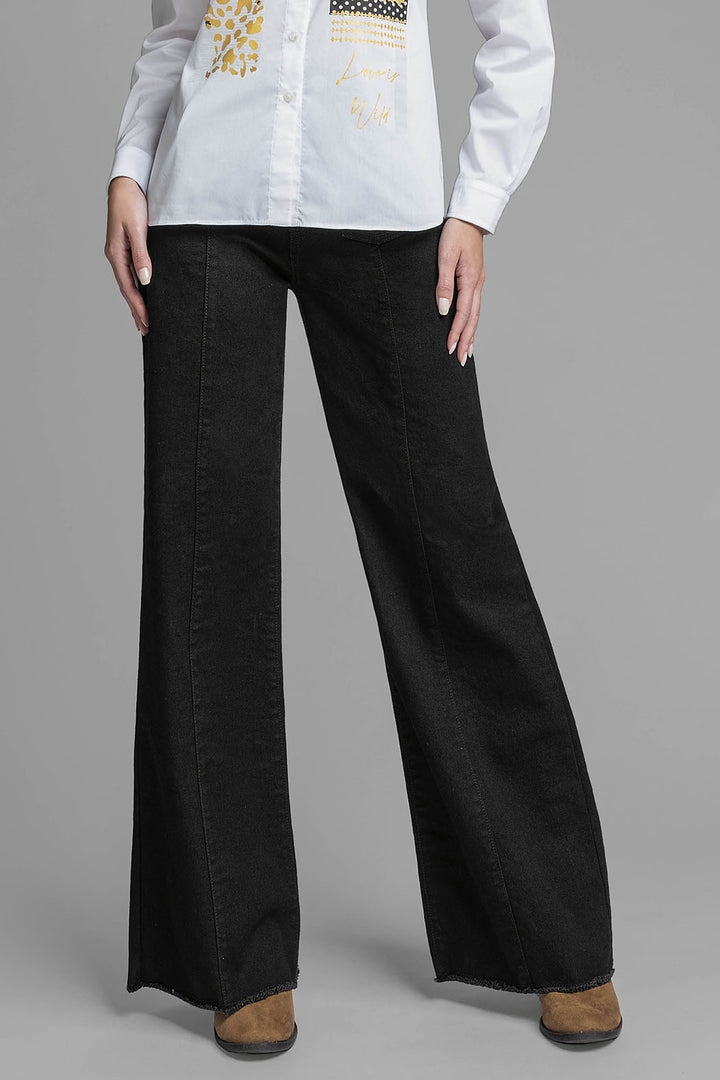 Jeans Corte Ancho Con Bolsas Al Frente